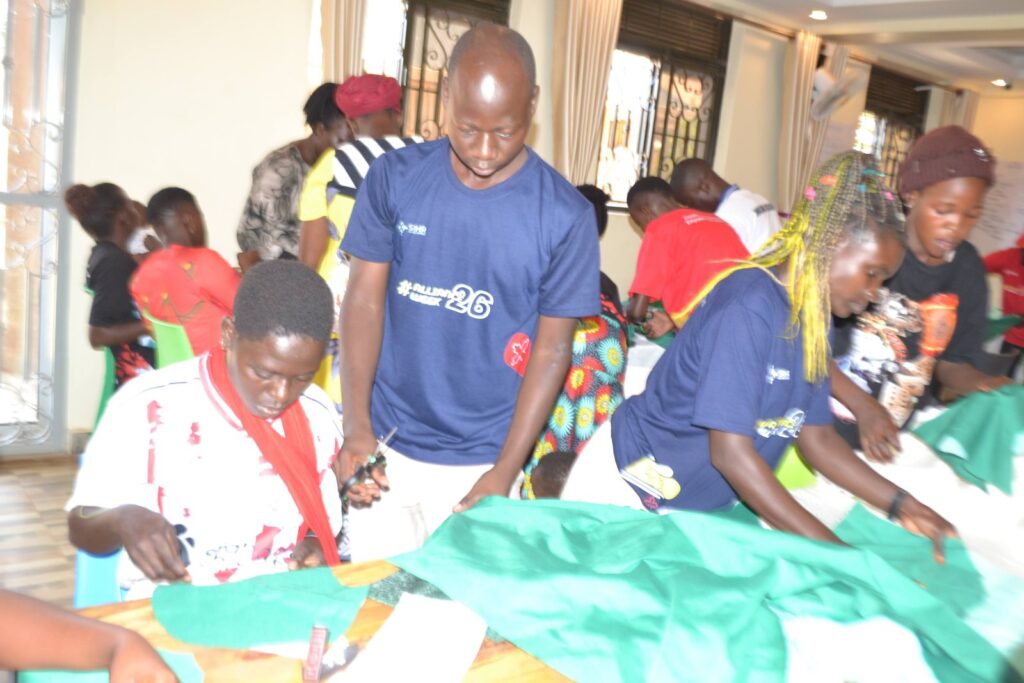 Youth champions cutting fabric for reusable pads